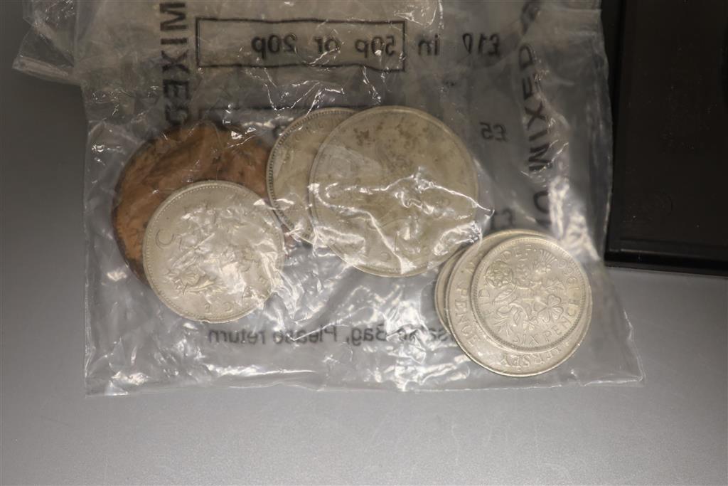 A mahogany box of world coins